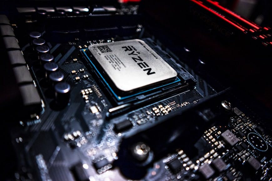 A close up, soft focus shot of an AMD Ryzen CPU on a motherboard of a homelab server